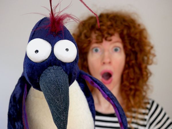 Bonnie Duncan of The Gottabees, with penguin puppet.